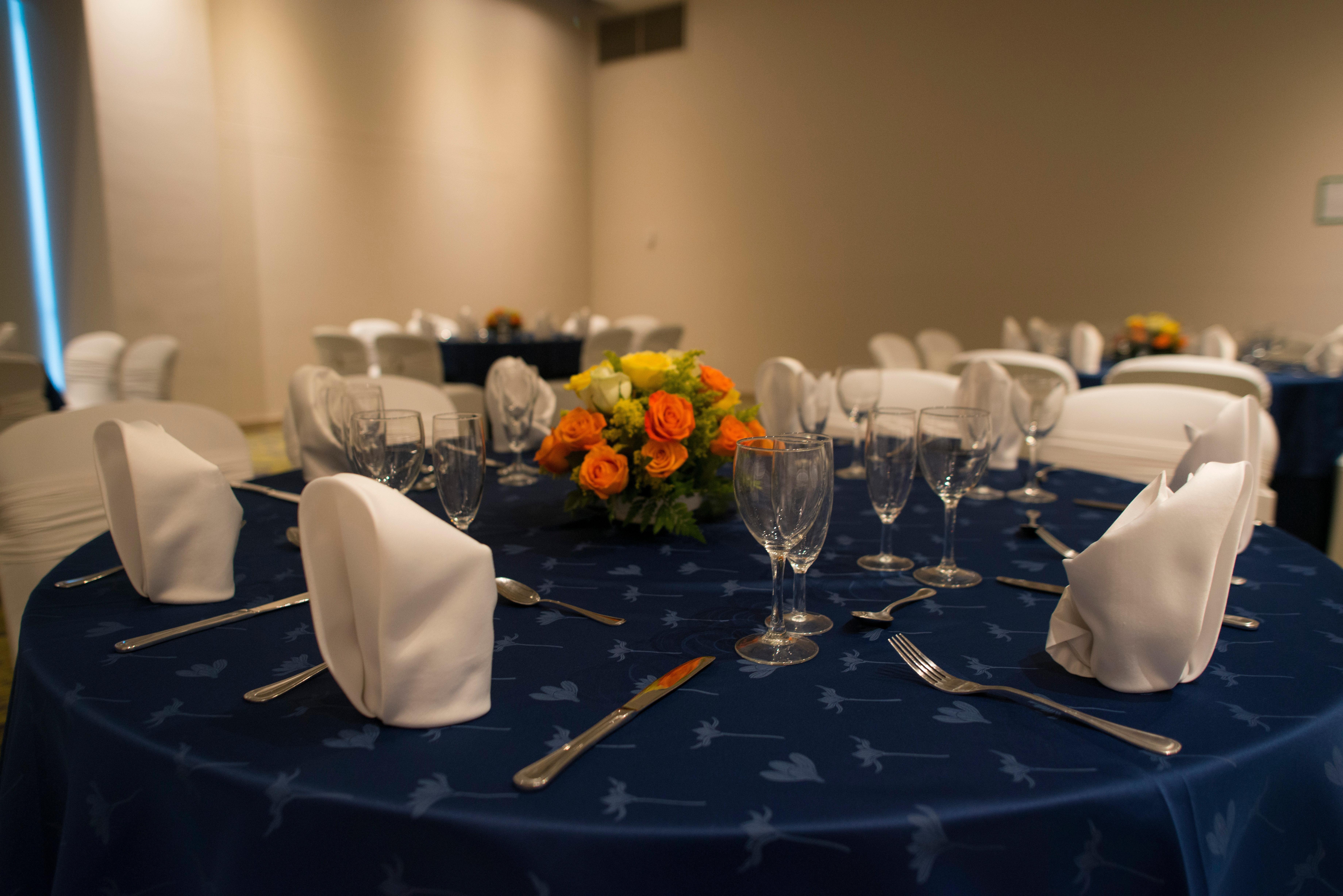Holiday Inn Cucuta By Ihg Екстер'єр фото A table set for a formal dinner